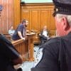 Man testifying in Court - How Does Governmental Immunity Apply to the Acts of Police Officers?