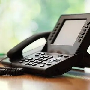 Contact the Police Officers Association of Michigan | Image of a desk phone | Sandusky Police Department