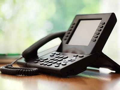 Contact the Police Officers Association of Michigan | Image of a desk phone | Sandusky Police Department