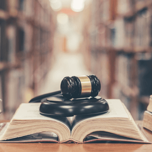 Direct Representation For Nonmembers | Union Operation Procedure | Gravel on top of an open book in a library. | Extended Legal Representation Plan