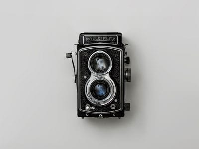 Photo of an old-school camera | Technology Use