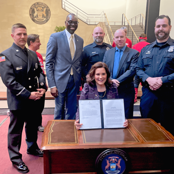 POAM Executive Board members John Graver, Jon Pignataro, and Anthony Hall attend the HB 4001 signing ceremony with Governor Whitmer and Lt. Governor Garlin Gilchrist.