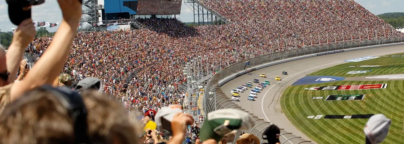 Photo of the racetrack and audience stands at the Michigan International Speedway