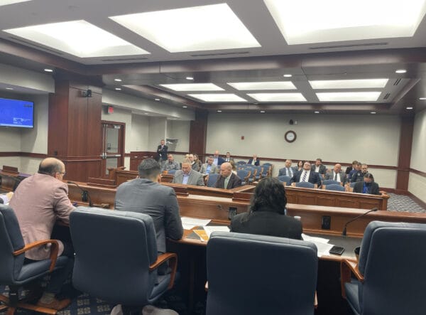 Joe Walker on left, Jon Pignataro on right, and Gregg Allgeier in the audience on the right side of the 312 Corrections Testimony hearing held by the Senate Labor Committee
