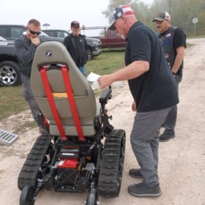 Veteran Chris Giles who received a TracFab chair donation.