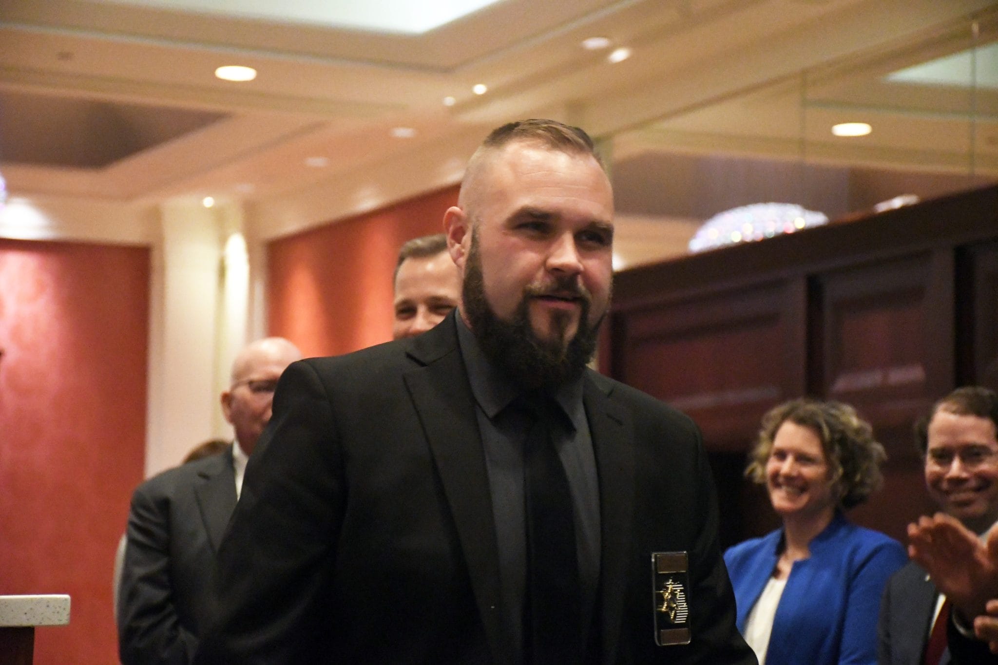 Oscoda County Deputy Ryan Blair receiving the 2025 POAM Police Officer of the Year Award.