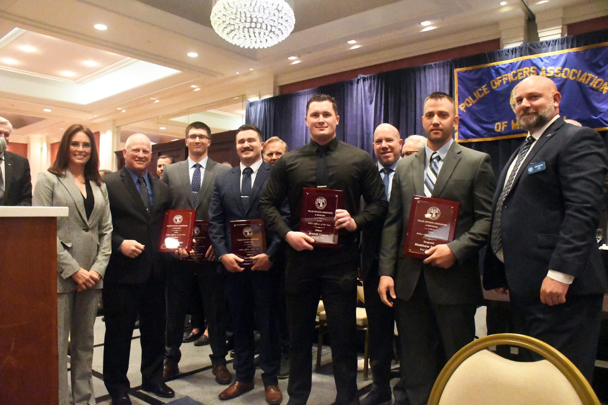 Bay City Officers Honored | Bay City Police Officers and Command Officers Associations' Officers Jacob Kirsch, Stephen Staron, Scott Selle, Brandt Cygan, and Sergeant Matthew Strunk receiving the 2025 Police Officer of the Year Award at the POAM Annual Convention.