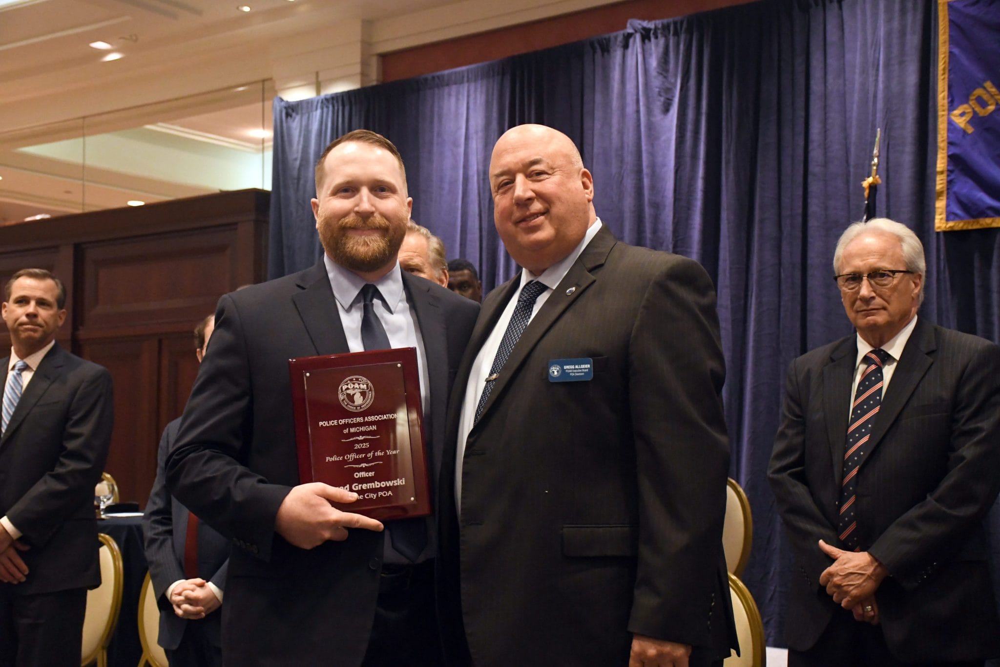 Wayne City POA Officer Jared Grembowski receiving the POAM 2025 Police Officer of the Year Award