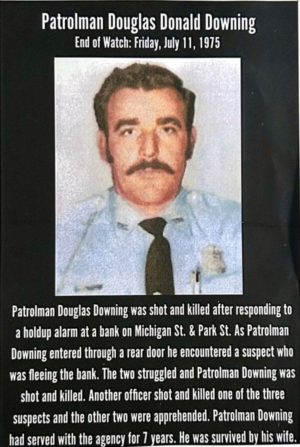 Patrolman Douglas Downing information about his passing.
