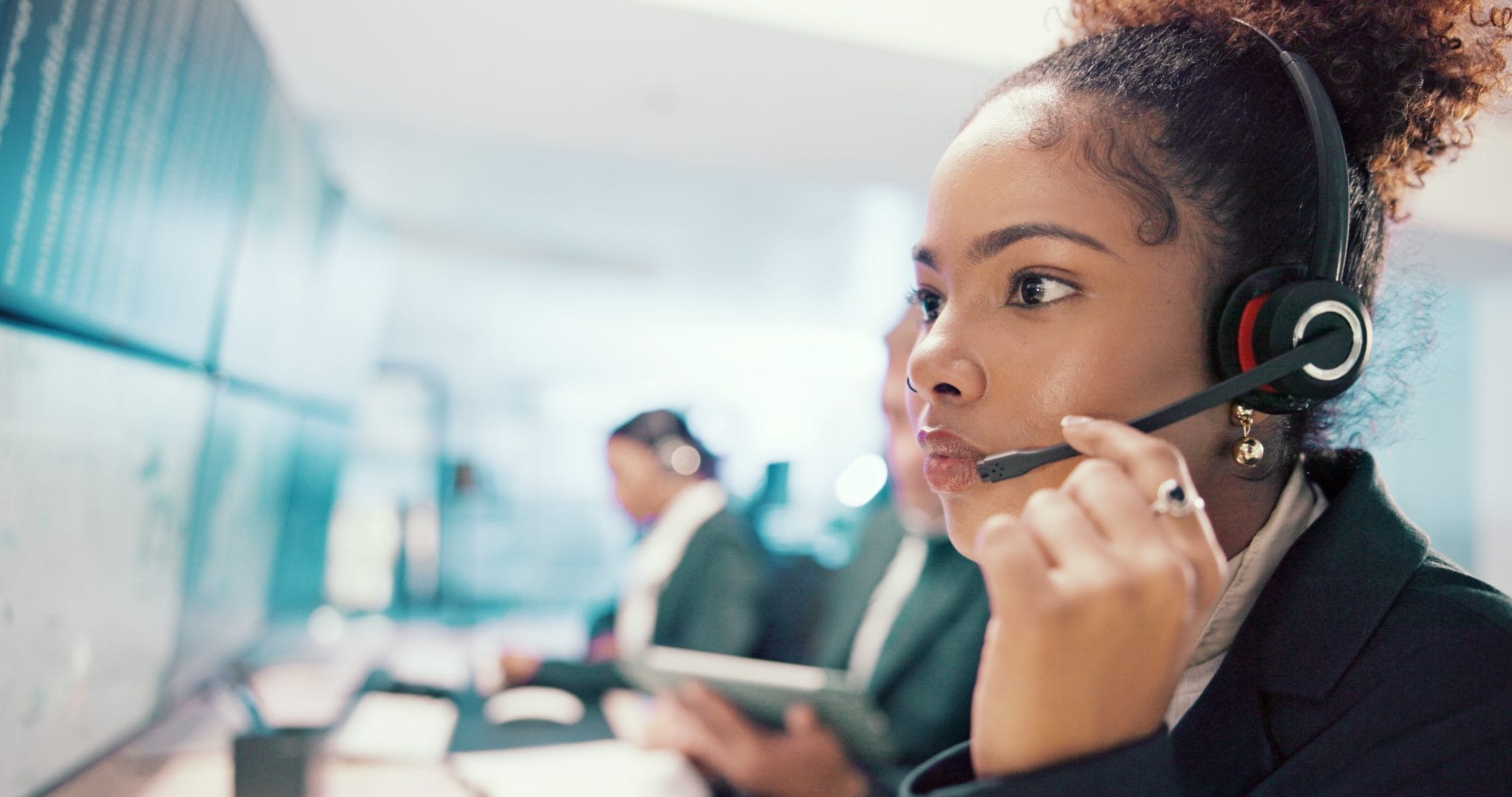 emergency-service-and-woman-on-computer-with-head