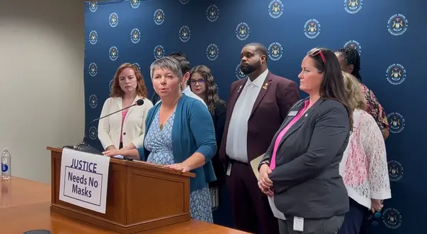 State Rep. Betsy Coffia (D-Traverse City) leads a press conference
