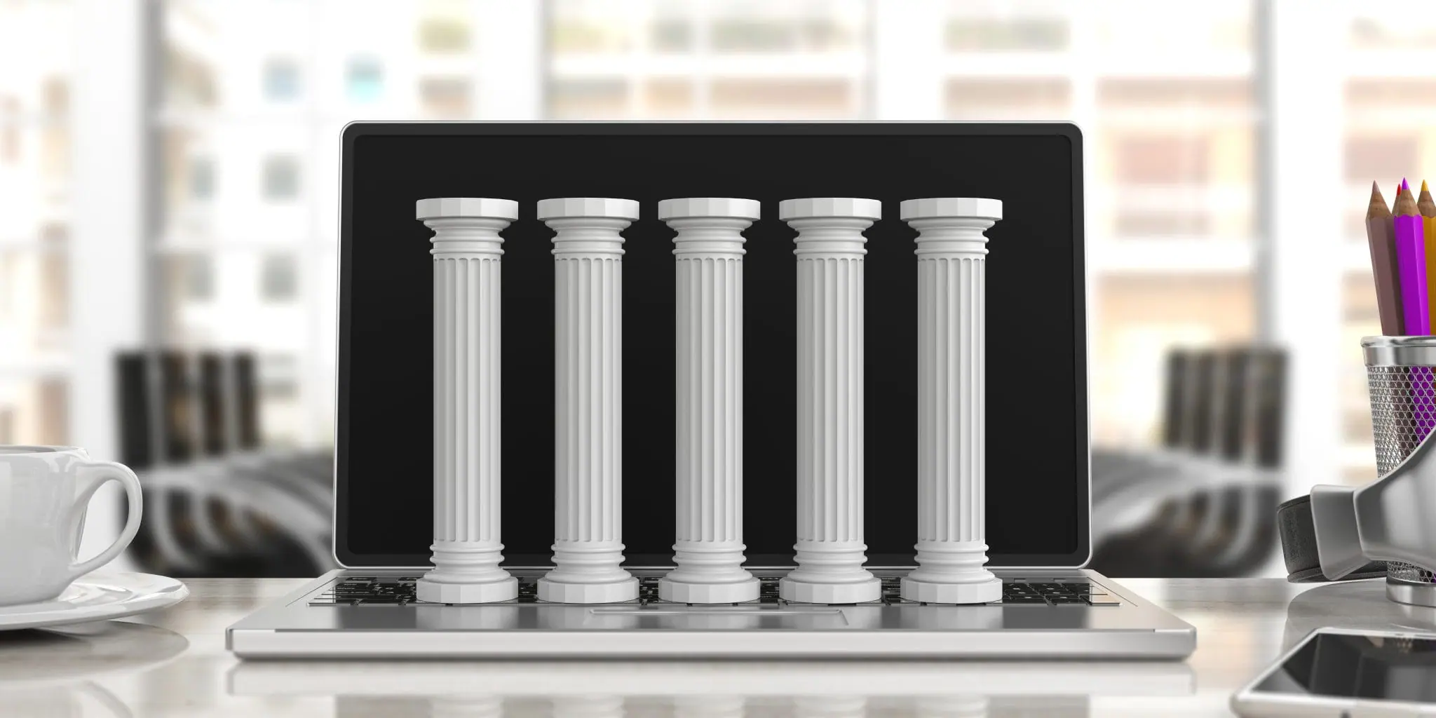 5 pillars sitting on laptop in office. Building a Solid Financial Foundation