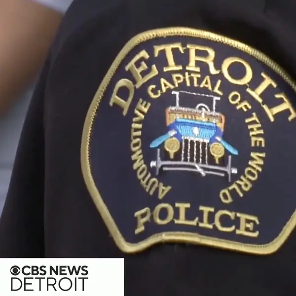 Recruiting and retaining officers - Detroit Police Badge on the shoulder of an officer